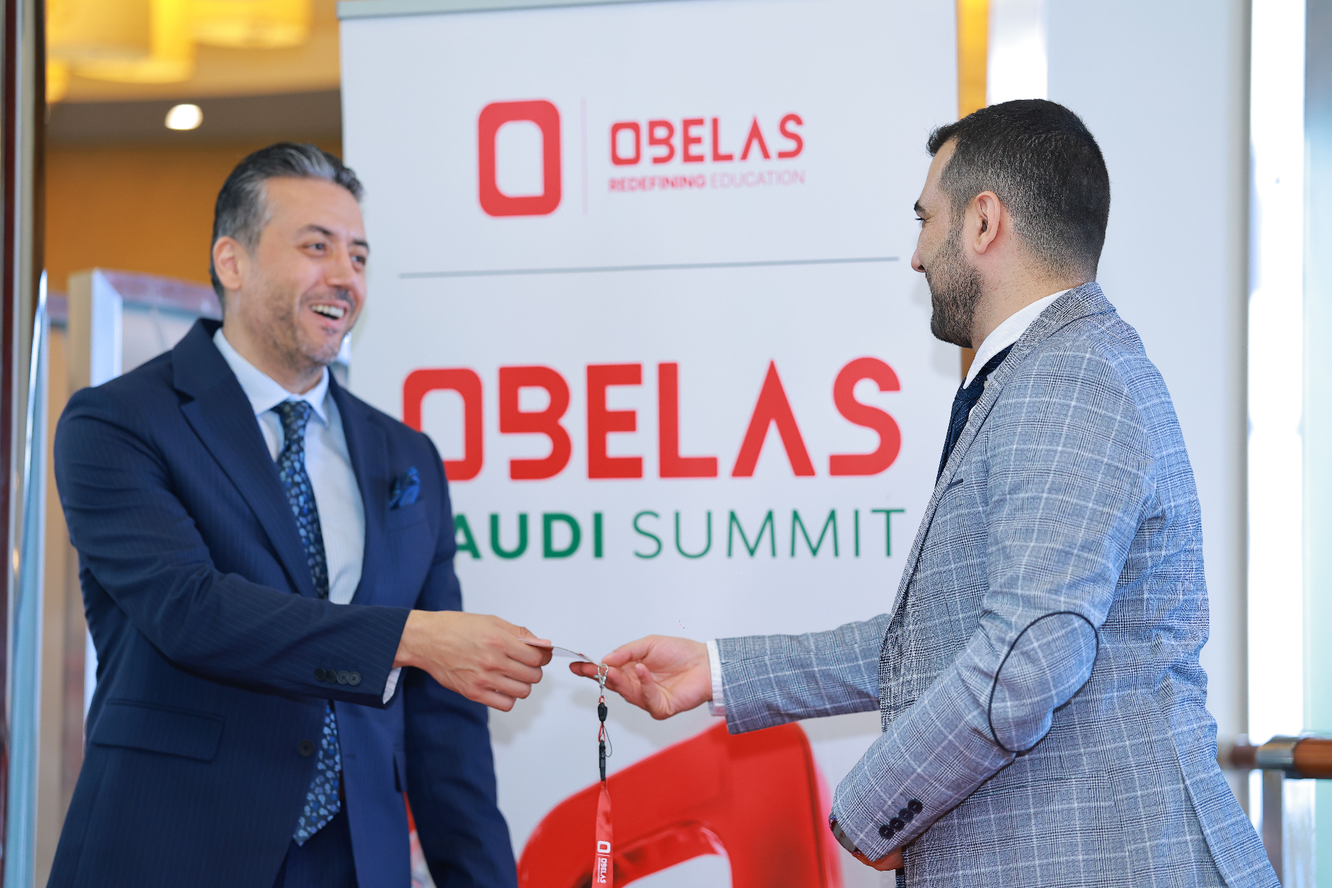 "Networking moment at the Saudi Summit"